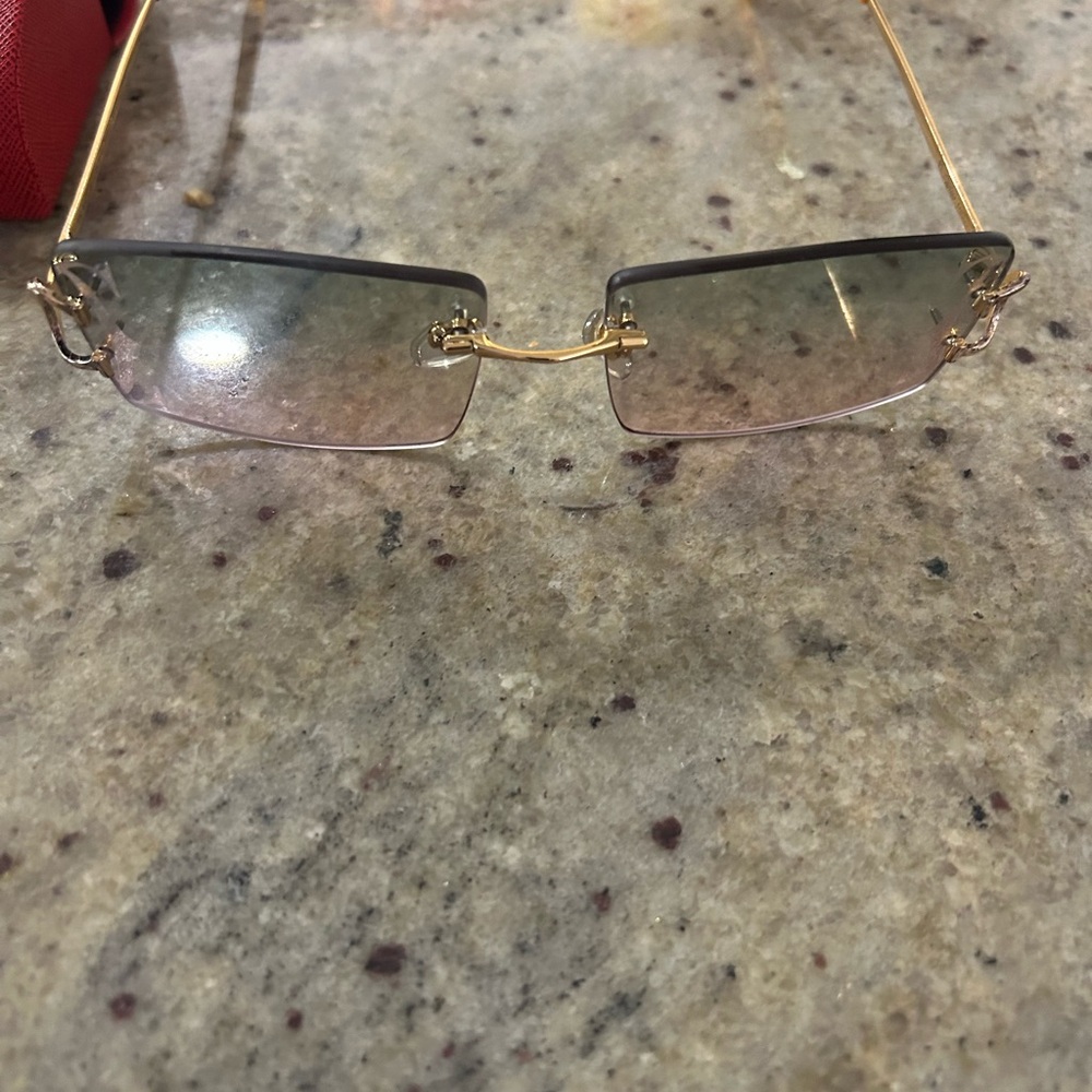 Gold Cartier designer Sunglasses